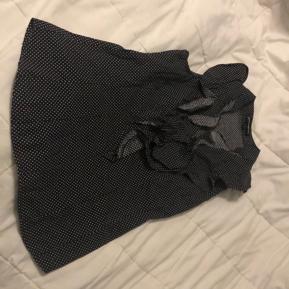 Women’s black and white polka dot shirt